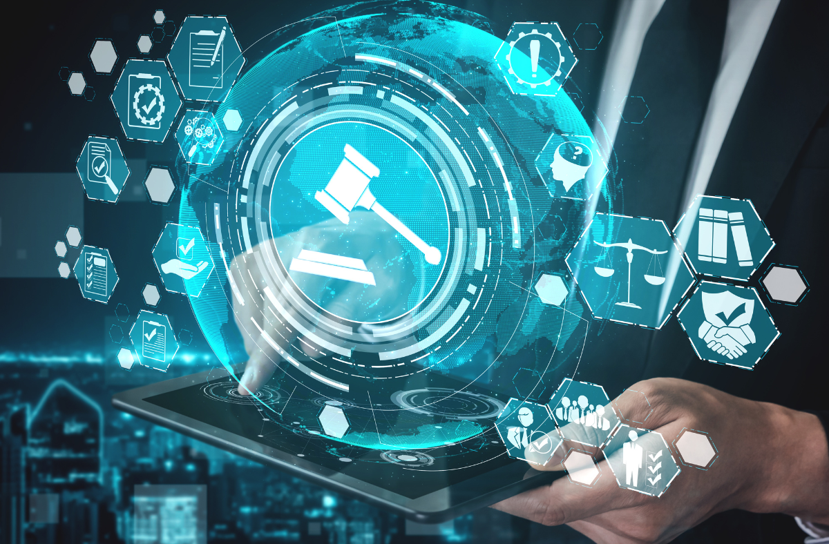 A person in a business suit holding a tablet with futuristic icons on it.